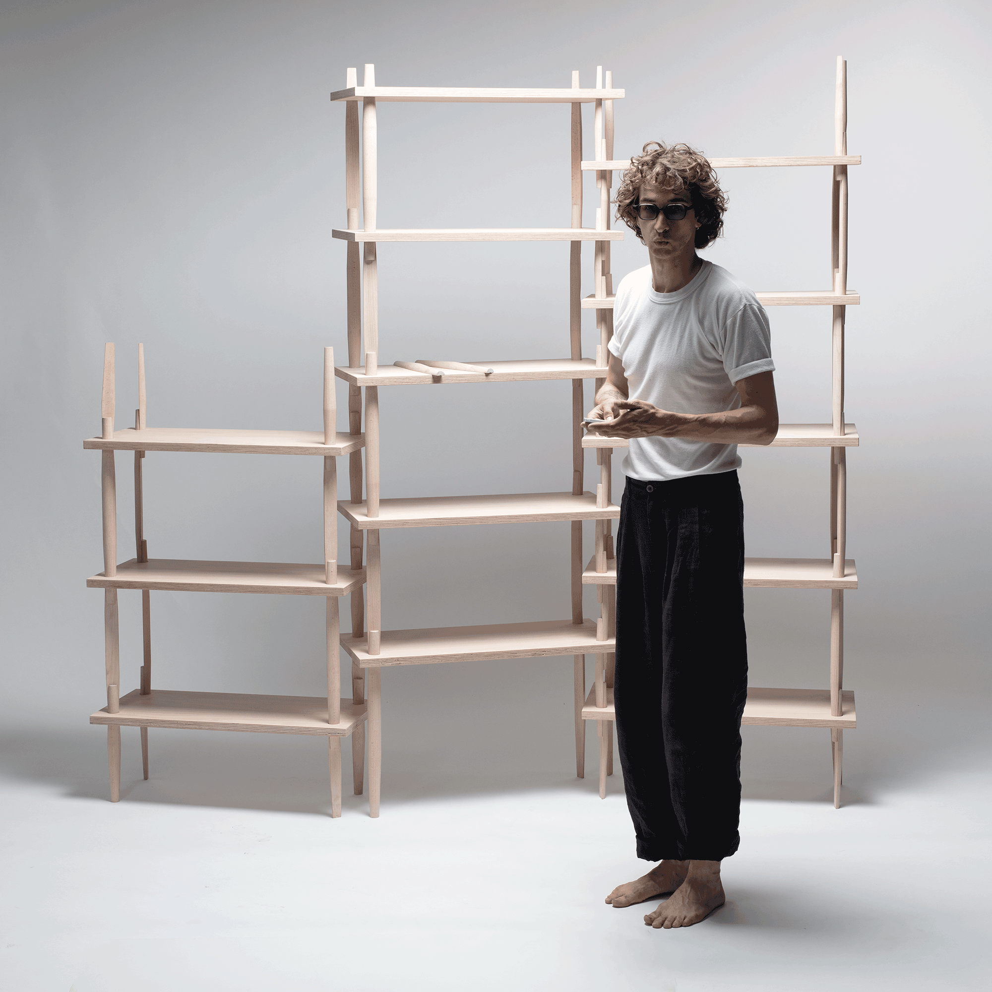 Modular shelving system: beech wood; 2023